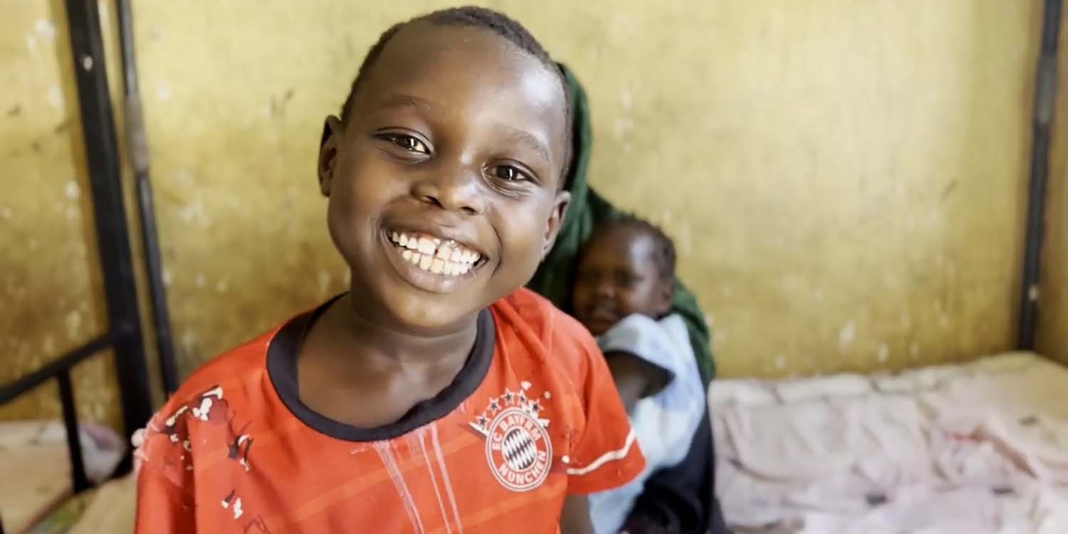Sudan, a little happy boy smiles at the camera. Sudan, a little happy boy smiles at the camera.