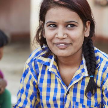 Asha a 19 year old girl looking away and smiling Asha a 19 year old girl looking away and smiling