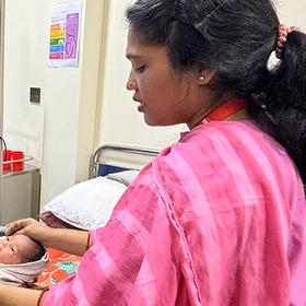 Somunda* 20 with her newborn baby, receiving care after delivery at the newly opened Maternal and Child Hospital at Cox's Bazar Somunda* 20 with her newborn baby, receiving care after delivery at the newly opened Maternal and Child Hospital at Cox's Bazar