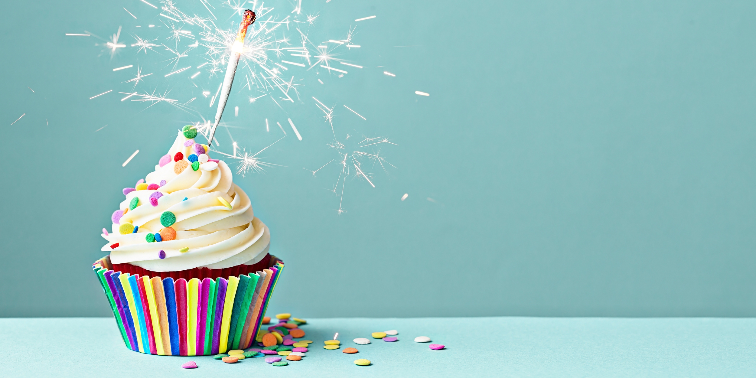 A birthday cake sits on a table. 