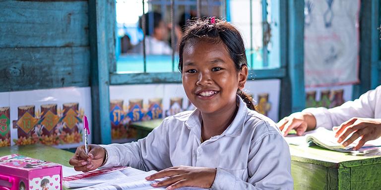 Kanha, 12, at her school on Tonle Sap Lake, Cambodia Kanha, 12, at her school on Tonle Sap Lake, Cambodia