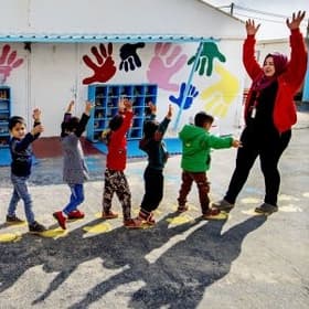 Children play in a child friendly space in Za'atari refugee camp in Jordan. Children play in a child friendly space in Za'atari refugee camp in Jordan.
