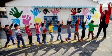 Children play in a child friendly space in Za'atari refugee camp in Jordan. Children play in a child friendly space in Za'atari refugee camp in Jordan.