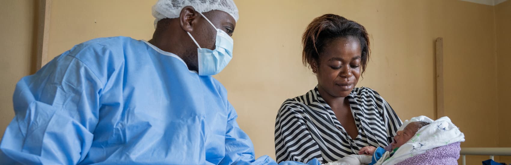 Ebola health clinic nurse Jules provides care for mother and newborn