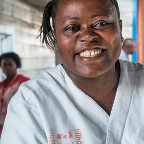 Colette is a nurse at the Ndosho Health Center, supported by Save the Children Family Planning & PAC Program since in 2013, operating in the Karisimbi Health Zone to deliver family planning services in additions to vaccinations, maternity care, pre-natal services, outpatient care, mother-to-child HIV transmission prevention, gender-based violence care, and ambulatory services. Colette is a nurse at the Ndosho Health Center, supported by Save the Children Family Planning & PAC Program since in 2013, operating in the Karisimbi Health Zone to deliver family planning services in additions to vaccinations, maternity care, pre-natal services, outpatient care, mother-to-child HIV transmission prevention, gender-based violence care, and ambulatory services.