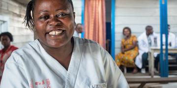 Colette is a nurse at the Ndosho Health Center, supported by Save the Children Family Planning & PAC Program since in 2013, operating in the Karisimbi Health Zone to deliver family planning services in additions to vaccinations, maternity care, pre-natal services, outpatient care, mother-to-child HIV transmission prevention, gender-based violence care, and ambulatory services. Colette is a nurse at the Ndosho Health Center, supported by Save the Children Family Planning & PAC Program since in 2013, operating in the Karisimbi Health Zone to deliver family planning services in additions to vaccinations, maternity care, pre-natal services, outpatient care, mother-to-child HIV transmission prevention, gender-based violence care, and ambulatory services.