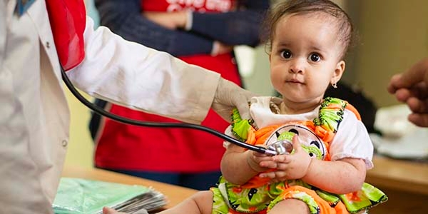 A young girl gets a check up in Egypt. A young girl gets a check up in Egypt.