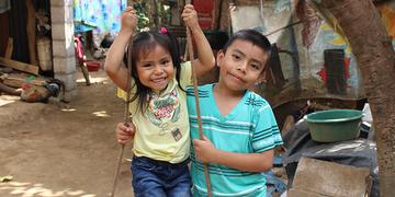 4-year-old Kenia having fun with her older brother David 4-year-old Kenia having fun with her older brother David