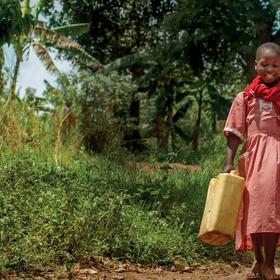 Because of the work of Save the Children, girls like Robina and Charity, ages 9 and 12, can safely fetch the family water – so they can get back to learning in Uganda. Photo credit: Save the Children/Rick D’Elia 2017. Because of the work of Save the Children, girls like Robina and Charity, ages 9 and 12, can safely fetch the family water – so they can get back to learning in Uganda. Photo credit: Save the Children/Rick D’Elia 2017.