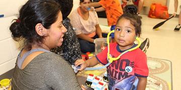 A child pages in a Child Friendly Space set up during Hurricane Florence A child pages in a Child Friendly Space set up during Hurricane Florence