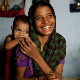 Sadma Khan, 19, with her daughter at her shared house in her mother's extended family's compound in a slum area of Rajasthan, India. Photo Credit: Suzanne Lee/Save the Children 2012. Sadma Khan, 19, with her daughter at her shared house in her mother's extended family's compound in a slum area of Rajasthan, India. Photo Credit: Suzanne Lee/Save the Children 2012.
