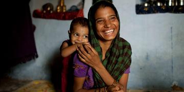 Sadma Khan, 19, with her daughter at her shared house in her mother's extended family's compound in a slum area of Rajasthan, India. Photo Credit: Suzanne Lee/Save the Children 2012. Sadma Khan, 19, with her daughter at her shared house in her mother's extended family's compound in a slum area of Rajasthan, India. Photo Credit: Suzanne Lee/Save the Children 2012.