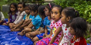 Children attend a Save the Children reading camp, a program that aims to boost literacy rates at a model primary school in West Sumba, Indonesia. Photo credit: Minzayar Oo/Save the Children 2017. Children attend a Save the Children reading camp, a program that aims to boost literacy rates at a model primary school in West Sumba, Indonesia. Photo credit: Minzayar Oo/Save the Children 2017.