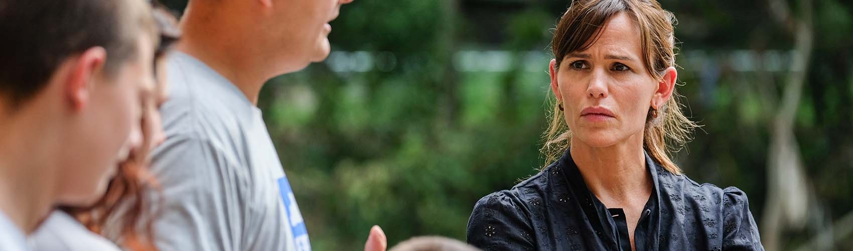 Save the Children Trustee Jennifer Garner meets with a family whose home was devasated by the flooding in Kentucky.