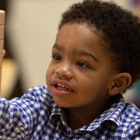 Louisiana, a little boy plays with blocks at a Save the Children Early Head Start center. Louisiana, a little boy plays with blocks at a Save the Children Early Head Start center.