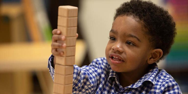 Louisiana, a little boy plays with blocks at a Save the Children Early Head Start center. Louisiana, a little boy plays with blocks at a Save the Children Early Head Start center.