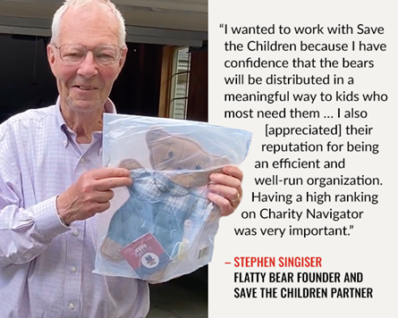 A Save the Children donor holding a stuffed bear. A Save the Children donor holding a stuffed bear.