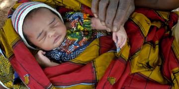 Tanzania has one of the highest rates of first day deaths in the world, and grieving mothers are told that mourning leads to infertility. 1 mother in every 30 in Tanzania will die during pregnancy or birth. Photo Credit Sala Lewis/Save the Children 2017.A community health worker makes a home visit to a seven-day-old newborn in Mali. The mother and baby are doing well. Only 44% of births in Mali have skilled workers present. Photo credit: Save the Children, November 2012. Tanzania has one of the highest rates of first day deaths in the world, and grieving mothers are told that mourning leads to infertility. 1 mother in every 30 in Tanzania will die during pregnancy or birth. Photo Credit Sala Lewis/Save the Children 2017.A community health worker makes a home visit to a seven-day-old newborn in Mali. The mother and baby are doing well. Only 44% of births in Mali have skilled workers present. Photo credit: Save the Children, November 2012.