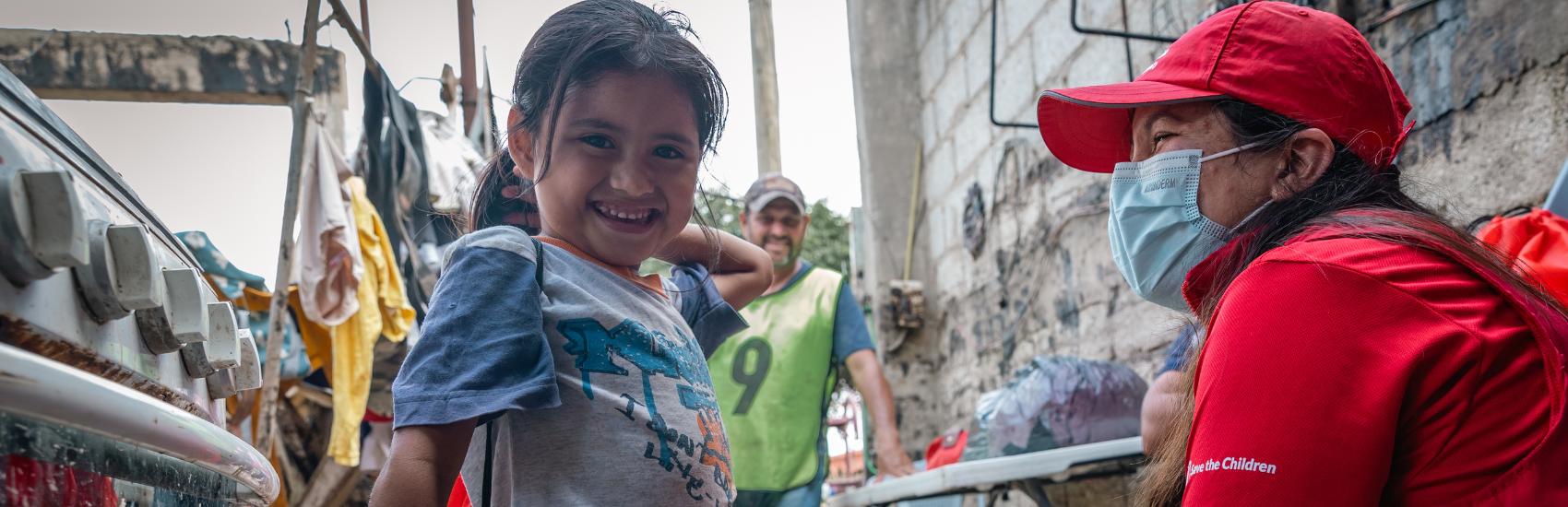 Celia, 5, happy with her psychosocial support kit Celia, 5, happy with her psychosocial support kit
