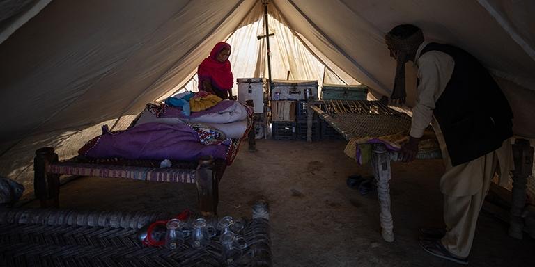 Pakistan, a family's house that was destroyed in the Pakistan floods, now lives with his wife and five children in a tent provided by Save the Children. Pakistan, a family's house that was destroyed in the Pakistan floods, now lives with his wife and five children in a tent provided by Save the Children.