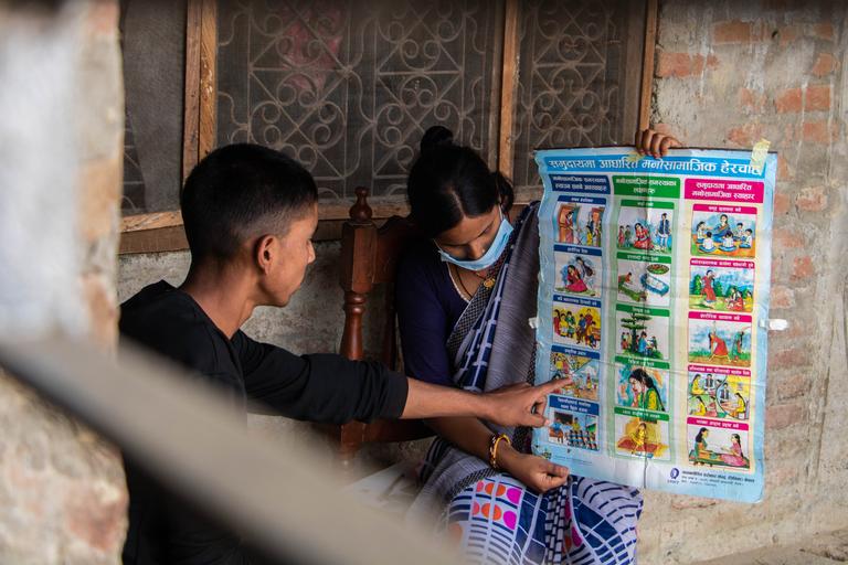 Nepal, a teenager in a black shirt joins in psychosocial counseling after COVID-19 lockdown. Nepal, a teenager in a black shirt joins in psychosocial counseling after COVID-19 lockdown.