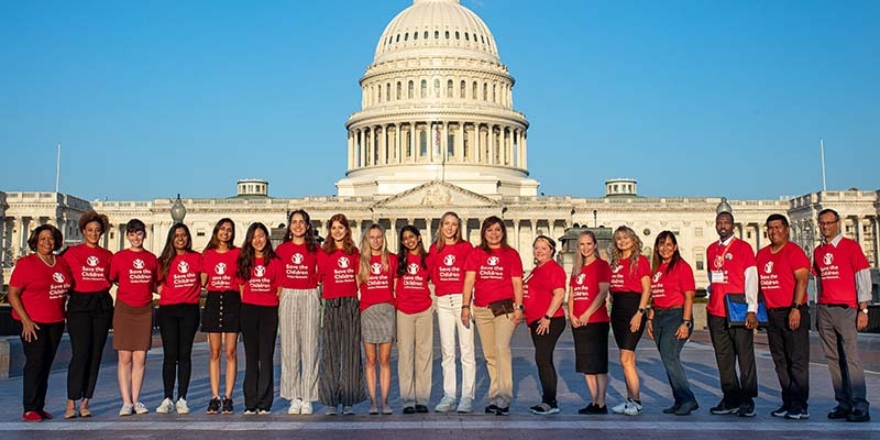 In Washington D.C., a group of student advocates wear Save the Children Action Network shirts and stand in front of the U.S. Capitol Building. In Washington D.C., a group of student advocates wear Save the Children Action Network shirts and stand in front of the U.S. Capitol Building.