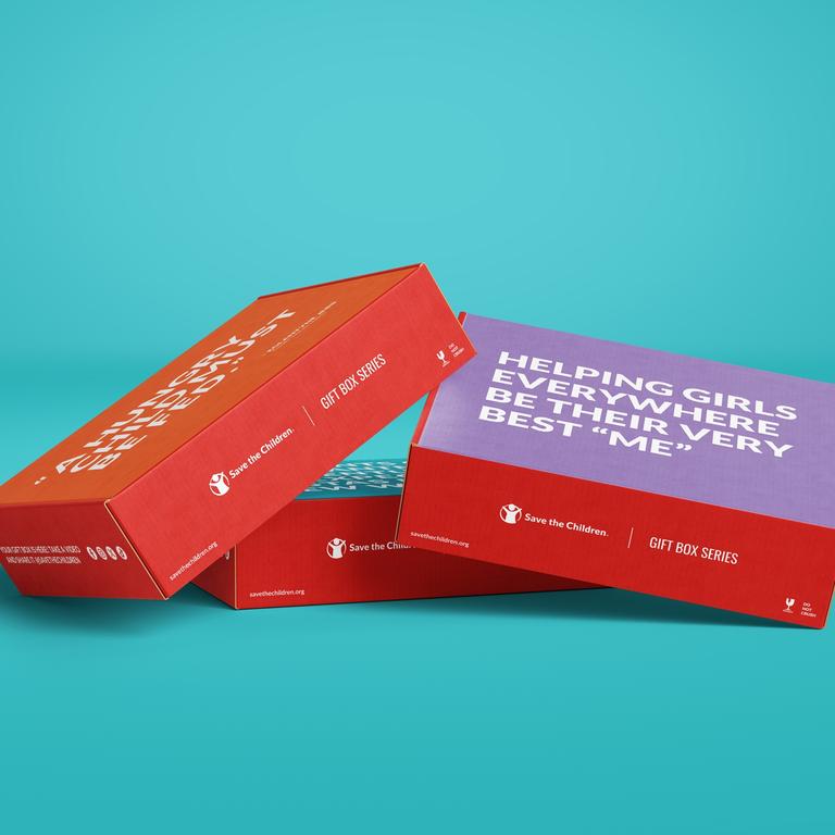Save the Children Gift Boxes are piled together. Save the Children Gift Boxes are piled together.