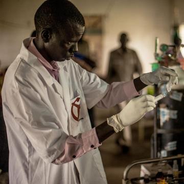 A Save the Children nurse at hospital in South Sudan prepares to treat a baby for pneumonia. Photo credit: Martin Kharumwa / Save the Children, Oct 2017. A Save the Children nurse at hospital in South Sudan prepares to treat a baby for pneumonia. Photo credit: Martin Kharumwa / Save the Children, Oct 2017.