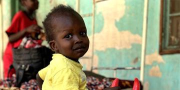 A toddler playing at a child friendly space in Sudan A toddler playing at a child friendly space in Sudan
