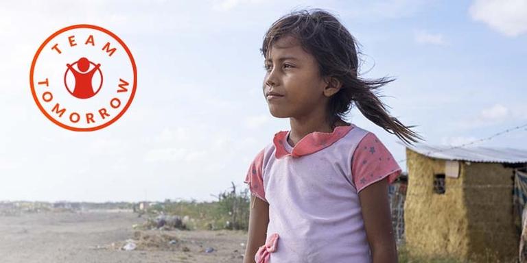 In Cambodia, a young girl stands near the shoreline where debris has washed up. In Cambodia, a young girl stands near the shoreline where debris has washed up.