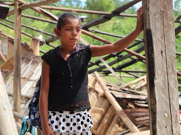 A young girl stands in front of her home that was destroyed in a hurricane in Nicaragua A young girl stands in front of her home that was destroyed in a hurricane in Nicaragua