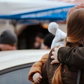 Ukrainian women and children crossing the border into Romania to escape conflict. Ukrainian women and children crossing the border into Romania to escape conflict.
