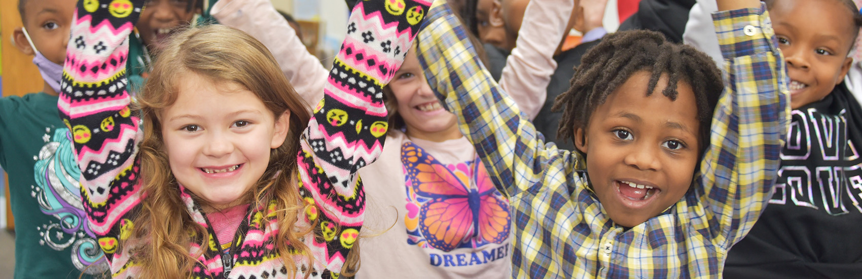 Children in the Emergent Reader Program excited to sing a song and play a game Children in the Emergent Reader Program excited to sing a song and play a game