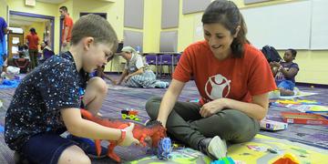 Children play with Child Friendly Space volunteers in the Florida Panhandle in the aftermath of Hurricane Michael. Save the Children’s Child Friendly Spaces are safe play areas in evacuation shelters where kids can be kids again, express themselves and begin to cope. Thanks to the generous support of our donors, we continue to help children, families and communities most affected by Hurricane Michael. Photo Credit: Save the Children / October 2018 Children play with Child Friendly Space volunteers in the Florida Panhandle in the aftermath of Hurricane Michael. Save the Children’s Child Friendly Spaces are safe play areas in evacuation shelters where kids can be kids again, express themselves and begin to cope. Thanks to the generous support of our donors, we continue to help children, families and communities most affected by Hurricane Michael. Photo Credit: Save the Children / October 2018