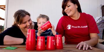 Victoria, one of our Early Childhood Specialists, works with 2-year-old Preston and his Mom during a home visit in Central Valley, California. Preston participates in Early Steps to School Success, a signature program for promoting school readiness. Photo credit: Save the Children/Tamar Levine, November 2017. Victoria, one of our Early Childhood Specialists, works with 2-year-old Preston and his Mom during a home visit in Central Valley, California. Preston participates in Early Steps to School Success, a signature program for promoting school readiness. Photo credit: Save the Children/Tamar Levine, November 2017.