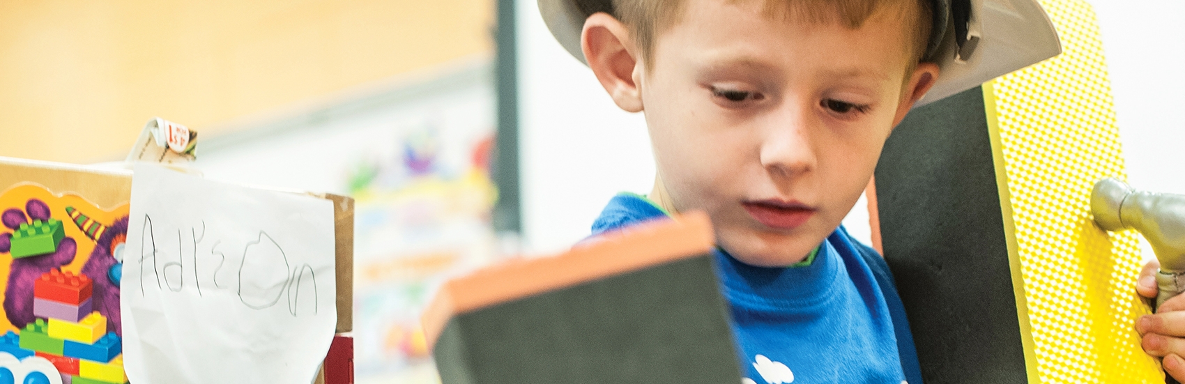 A four-year-old boy plays with building blocks in a preschool program in Mason, West Virginia. Photo credit: Susan Warner/Save the Children, February 2015.