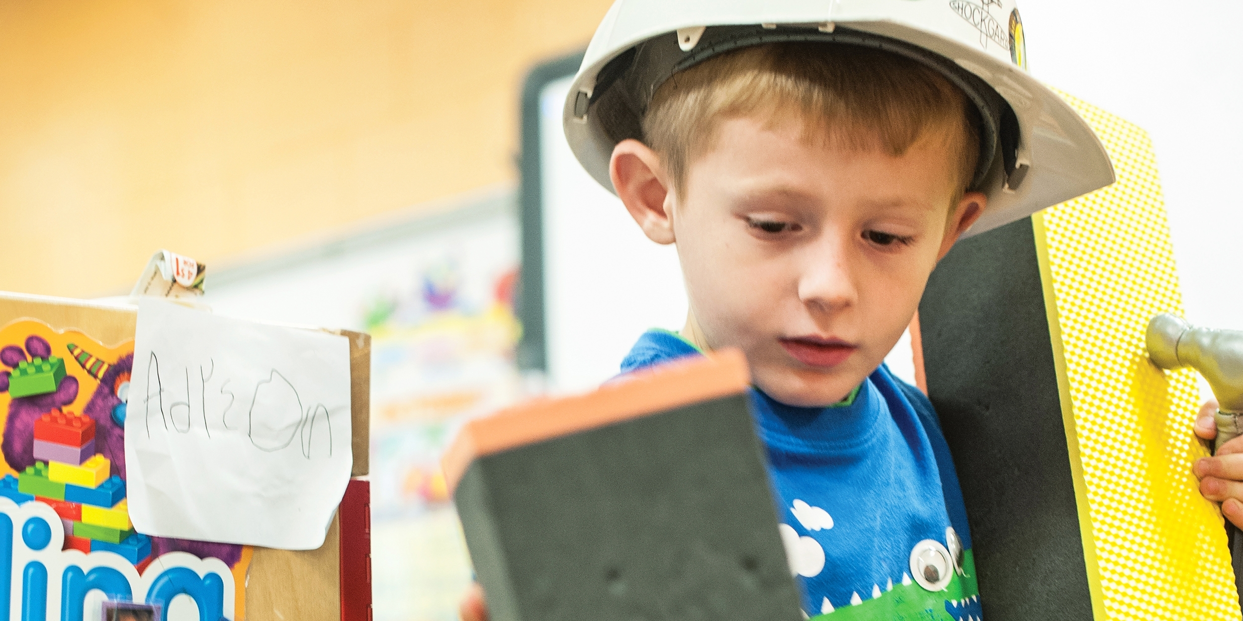 A four-year-old boy plays with building blocks in a preschool program in Mason, West Virginia. Photo credit: Susan Warner/Save the Children, February 2015.