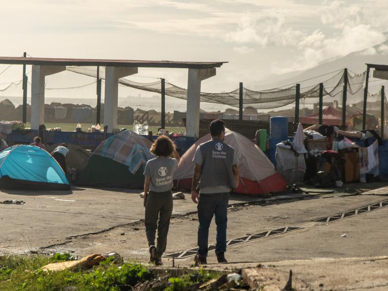 Save the Children staff visit people living in tents in the aftermath of the earthquake