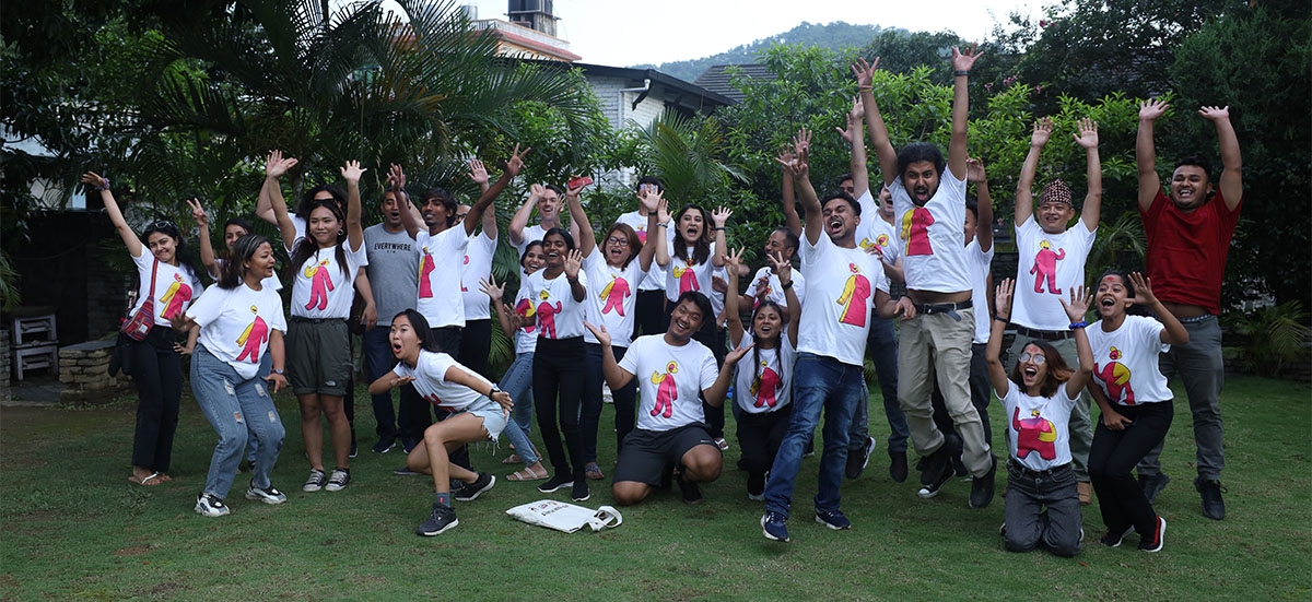 Happy people waving, jumping and smiling