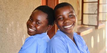 Chiluba (right) and Agness (left) posing for a photo Chiluba (right) and Agness (left) posing for a photo